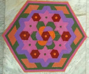 Margazhi Day 23 Kolam - A dotted rangoli with recycled colours. 15-8 interlaced dots. 