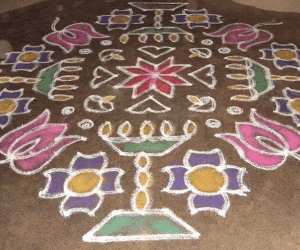 Rangoli: Lamps and lotus buds