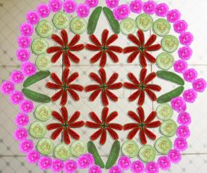 Rangoli: Veg, fruit & flower desgin.