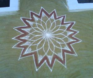 line kolam. by putting thin lines in the form of arc this kolam is finished.