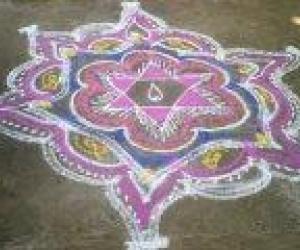 rangoli drawn in front of thulasi madam.