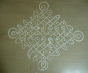 Ezhai kolam with dots