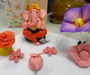 Rangoli: Color clay dough Ganesha