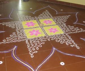 Rangoli: Dotted Rangoli - The line goes like creeper and shapes out like a star