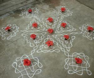 Dotted kolam with hibiscus flower