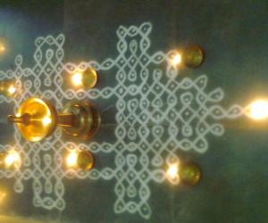 Karthigai kolam with vilakku