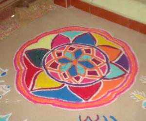 rangoli drawn on pooja function