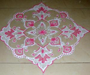 Pink and white design kolam