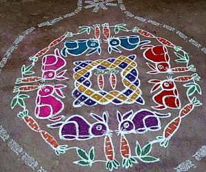 Rangoli: Rabbits eating carrots