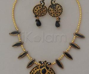 Black leaf shaped crystal beads chain_with peacock pendant & earring set