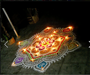 karthigai kolam with diyas