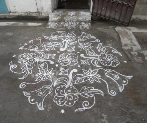 Rangoli: Different Flower Kolam in White.