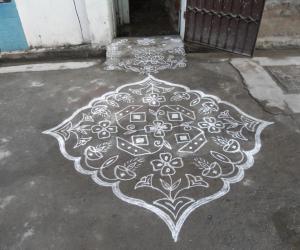 Kolam in white. Deepam kolam.