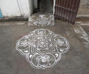 Very simple and different kolam in white.