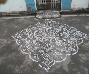 Butterfly & Flower Kolam in White.