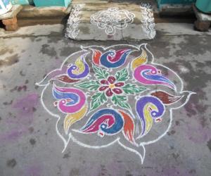 Rangoli: Flying colour colour cranes kolam.