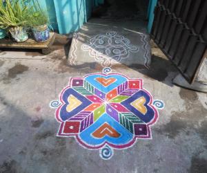 A simple colourful Kolam.