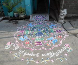 Tamil Puthandu Vazuthukal in advance. Dancing Peacock & Butterflies with flowers.