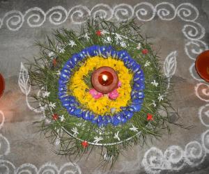 Karthigai decoration with arugampul, sangupoo & yellow poo.