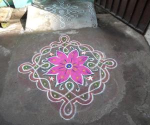 Chikku kolam with flower.