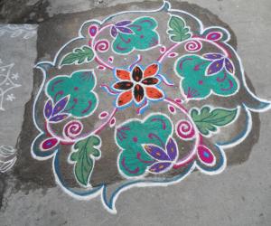 A green kolam design.