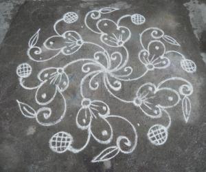 Rangoli: Kolam in white, daily kolam.