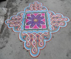 Flower & chikku kolam.