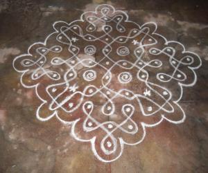 Chikku kolam in white.