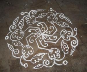 Daily kolam in white.