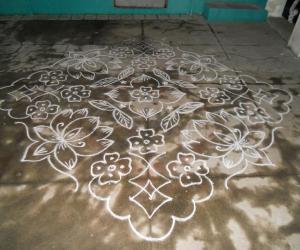 Lotus kolam in white.