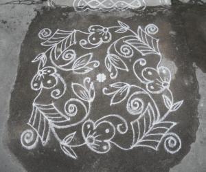 Daily kolam in white.