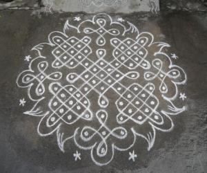 Chikku kolam in white.