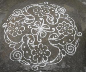 Bird & flower kolam.