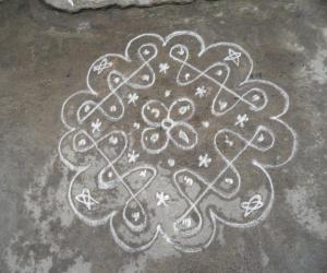 Rangoli: A simple daily kolam.