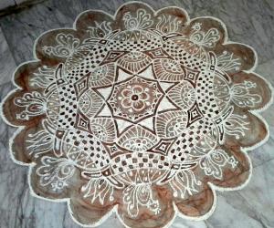 Padi kolam with rice flour  and kavi for margazhi