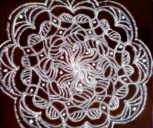 freehand rangoli with rice flour