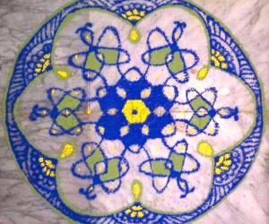 Chikku kolam with 9-5 interlaced dots