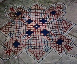 Chikku kolam for Thai Poosam  with 15-15 straight dots with 5 dots 3 lines  in the centre on all sides