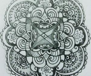 A freehand  mandala  on  paper  with  pencil 