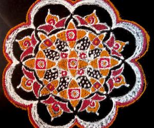 Dotted Pooja Kolam with  freehand  extension 