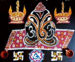 Simple Ganesha kolam with rice flour, haldi, Kumkum. 