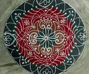 Freehand rangoli with recycled colours 