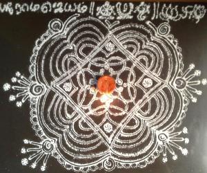 freehand rangoli with rice flour