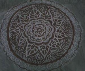 Free hand kolam with rice flour and kavi for margazhi