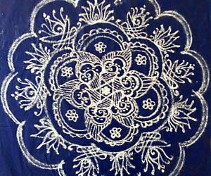 Margazhi Day 11 kolam - A freehand design with kolamavu on Blue plastic cover 