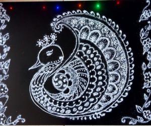 White Peacock Rangoli for Saraswathi Pooja