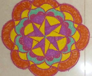 Freehand Rangoli with recycled colours