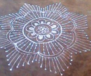 simple rangoli with dots and lines