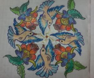 birds rangoli with flowers