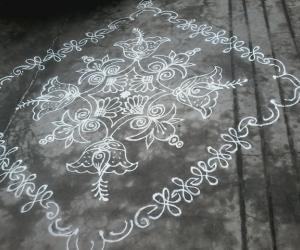 Flower rangoli with 14-2 dots